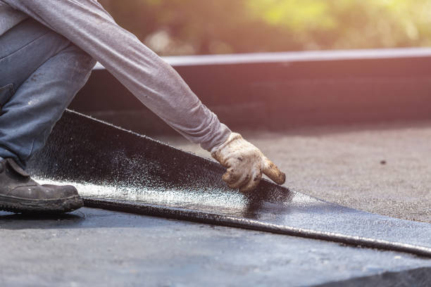 Professional Basement Waterproofing technician working in Northport, AL